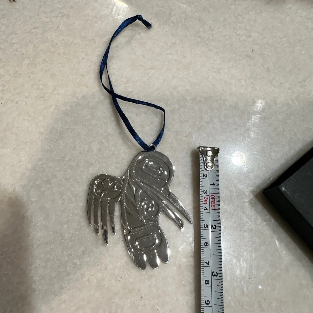 Set of two vintage silver plated Native American Christmas ornaments